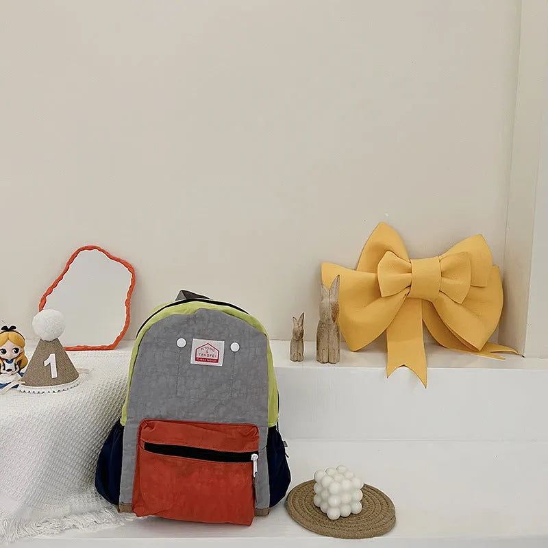 Bolsos para niños Mochila de lona simple y liviana Protección de la columna vertebral para niños y niñas