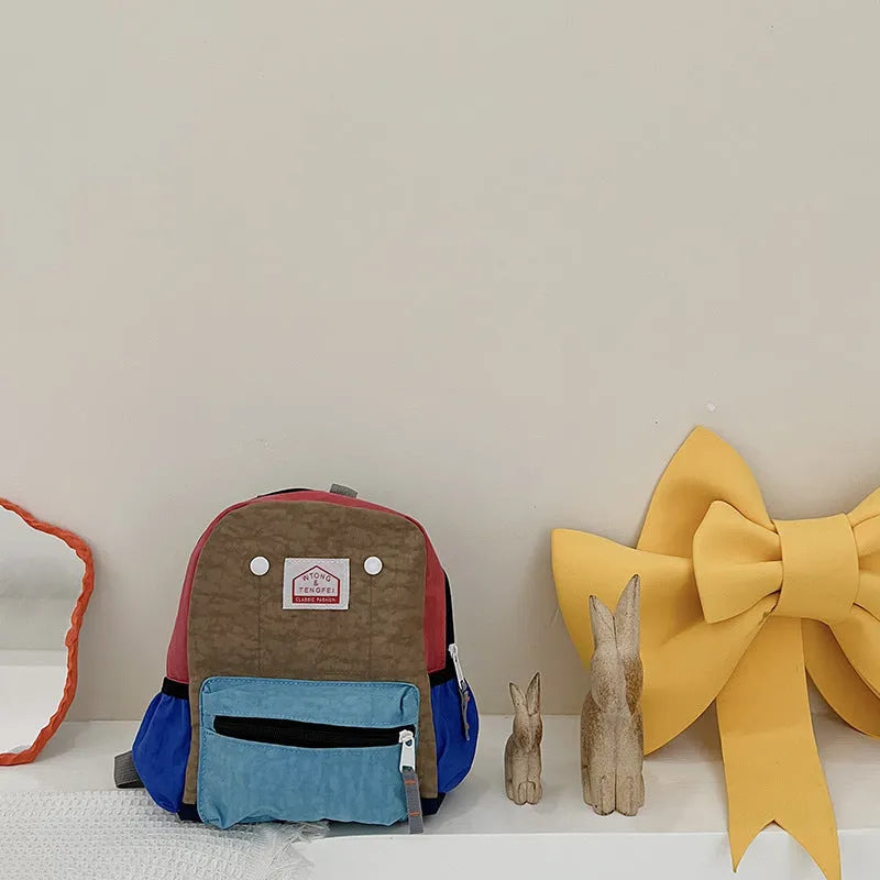 Bolsos para niños Mochila de lona simple y liviana Protección de la columna vertebral para niños y niñas