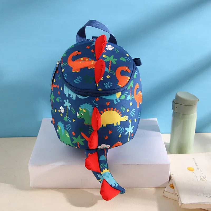 Mochila escolar de dinosaurios de dibujos animados antipérdida para niños Mochila de jardín de infantes